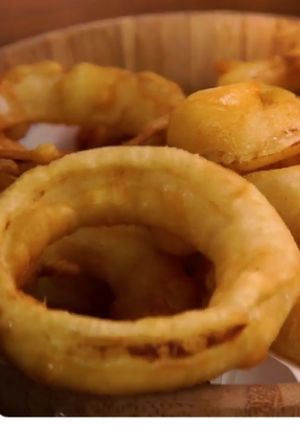 Una foto de Aros de Cebolla🍟🍺