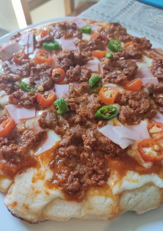 Una foto de Pizza al sartén