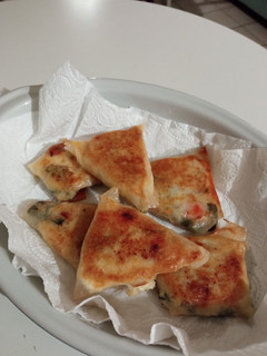 Une photo de Samoussas courgettes saucisses mozza