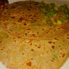 A picture of Raagi Aate Me Green Peas Stuffed Healthy Prandha.