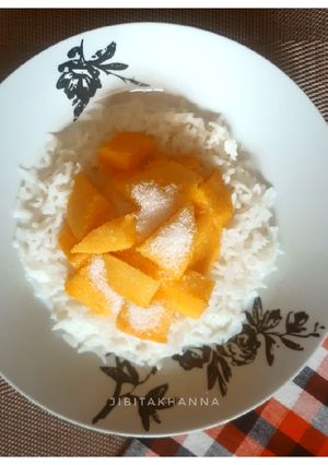 A picture of Aam Dudh Bhaat (Rice with Mango and milk).