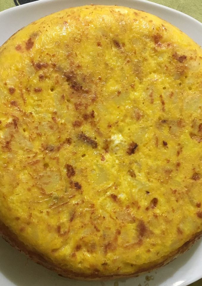 Una foto de Tortilla de patata rellena