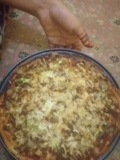 صورة لوصفة بيتزا في البيت