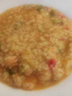 Una foto de Arroz meloso con gambas