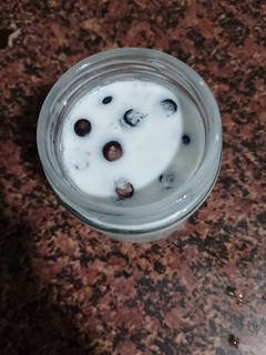 Una foto de Yogures caseros de piña y arándanos