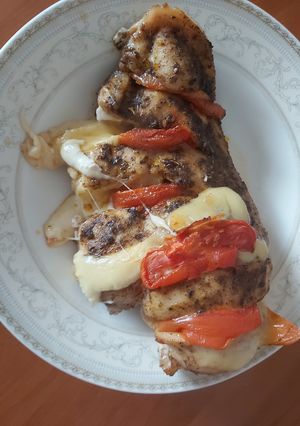 A picture of Chicken Breast with Cheese and Tomato.