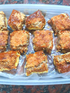Una foto de Cuadraditos de coco y dulce de leche