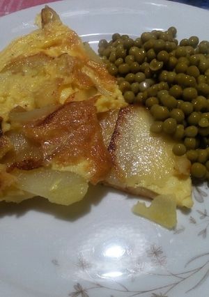 A picture of Potato Frittata with a Side of Peas.