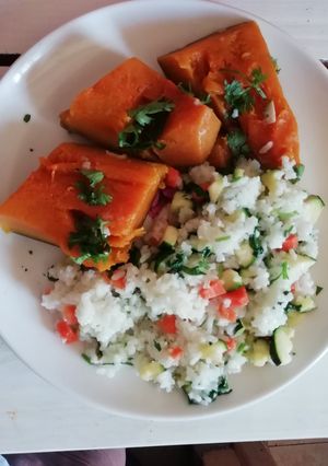 A picture of Pumkin served with vegetable rice.