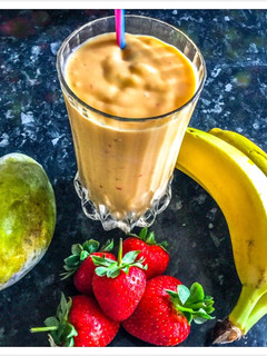 A picture of Mango Smoothie with banana strawberry & Greekyogurt.