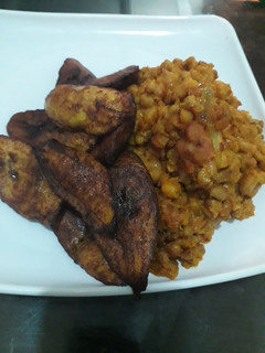 A picture of Beans and fried plantain.