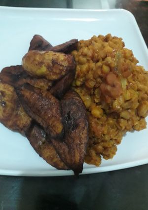A picture of Beans and fried plantain.