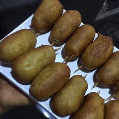 A picture of Corn dogs.