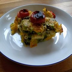 A picture of Courgettes and peas bake.