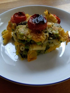 A picture of Courgettes and peas bake.