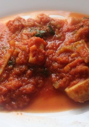 Una foto de Pota con tomate