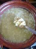 Criadillas de toro en salsa verde con papas