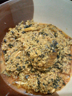 A picture of Egusi soup with fresh fish.
