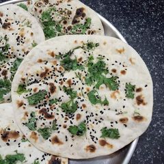 A picture of 3 Types of Naan - Plain/Butter Naan, Garlic Butter Naan and Stuffed Cheesy Garlic Naan !!.