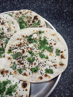 A picture of 3 Types of Naan - Plain/Butter Naan, Garlic Butter Naan and Stuffed Cheesy Garlic Naan !!.