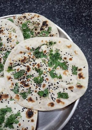 A picture of 3 Types of Naan - Plain/Butter Naan, Garlic Butter Naan and Stuffed Cheesy Garlic Naan !!.