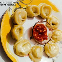 Chicken Cheese Momos A picture of Chicken Cheese Momos.