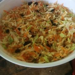 A picture of Cabbage salad with raisin.