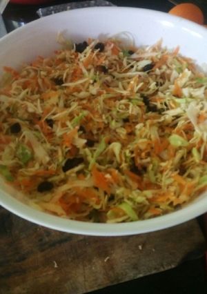 A picture of Cabbage salad with raisin.