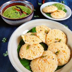 A picture of Carrot Idli with coriander coconut chutney.