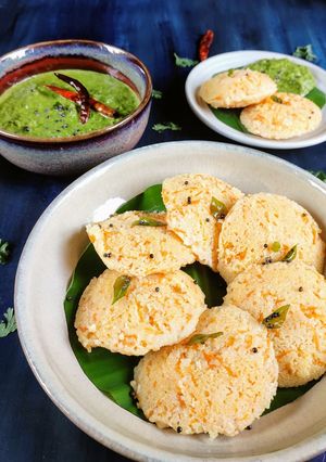 A picture of Carrot Idli with coriander coconut chutney.