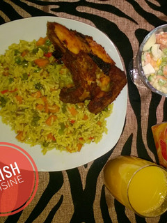 A picture of Fried rice, chicken and salad.