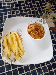 A picture of Sweet potatoes and cabbage sauces.