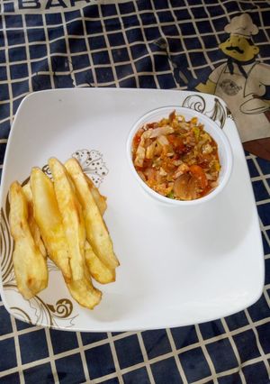 A picture of Sweet potatoes and cabbage sauces.