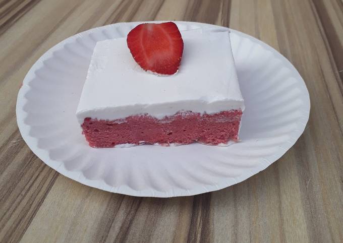 Strawberry milk cake with whipped cream frosting