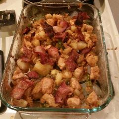 A picture of cincy style chicken and potato extravaganza .