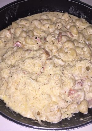 Una foto de Caracoles de pasta con salsa