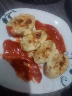 صورة لوصفة قوارب البطاطا محشية بالدجاج وصلصة البيشاميل 👌😋