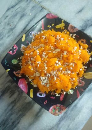 A picture of Sooji Halwa in orange Creation.