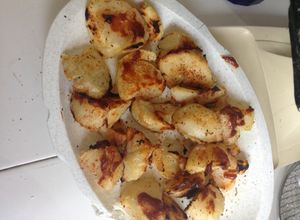 Una foto de Papas al horno picosas