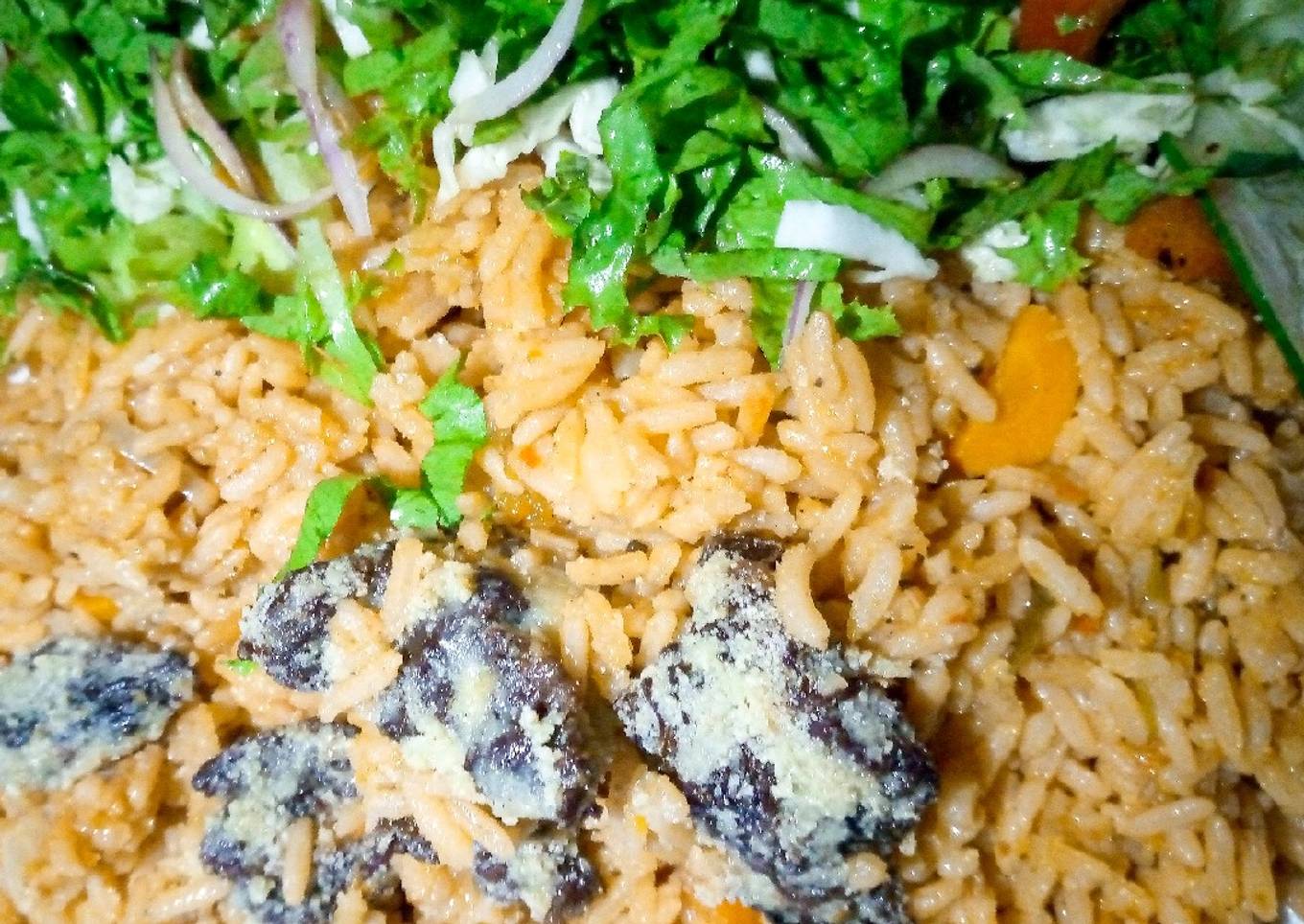 Native Jollof rice with salad