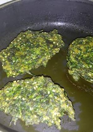 Una foto de Buñuelitos de espinaca y semillas