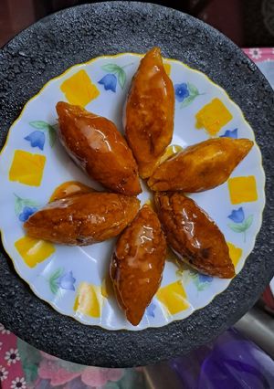 মুগরসপুলি পিঠে (moong raspuli pithe recipe in bengali) রেসিপির প্রধান ছবি
