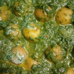 A picture of Palak paneer kofta.