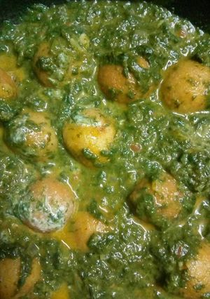 A picture of Palak paneer kofta.