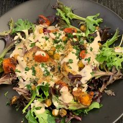 A picture of Roasted Tofu with Chickpeas, Tomatoes and Tahini.