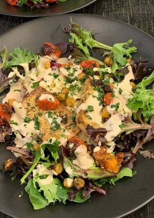 A picture of Roasted Tofu with Chickpeas, Tomatoes and Tahini.
