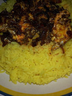 A picture of Tumeric rice with egg sauce.
