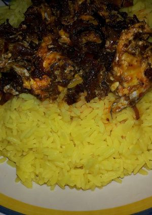 A picture of Tumeric rice with egg sauce.