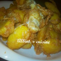 A picture of Irish potatoes with egg.
