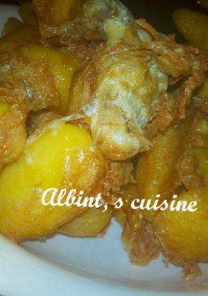A picture of Irish potatoes with egg.